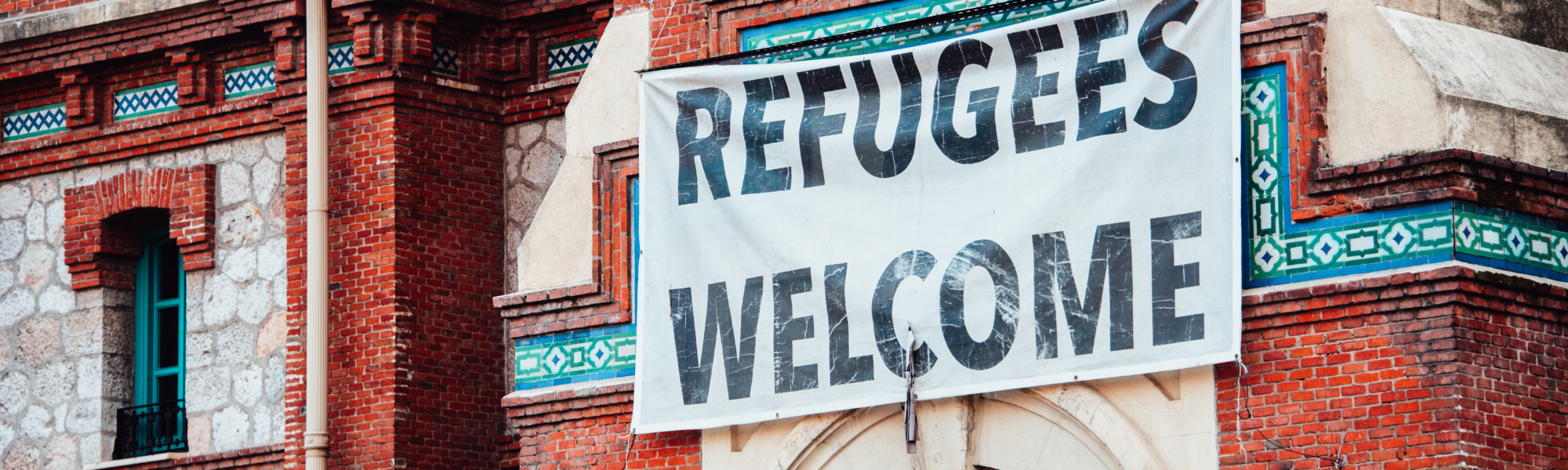 "Refugees Welcome" banner