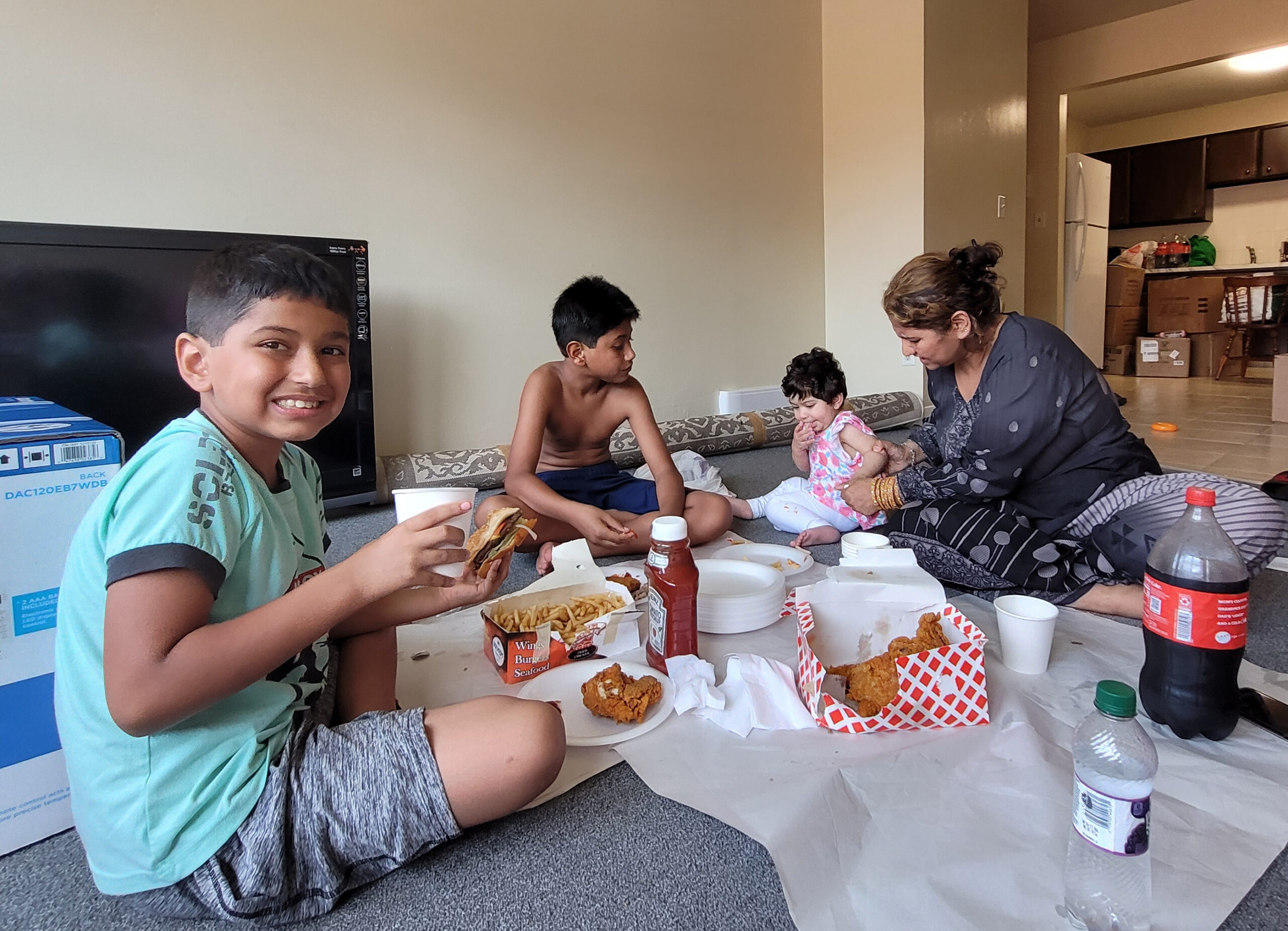 The Islahs in their new apartment